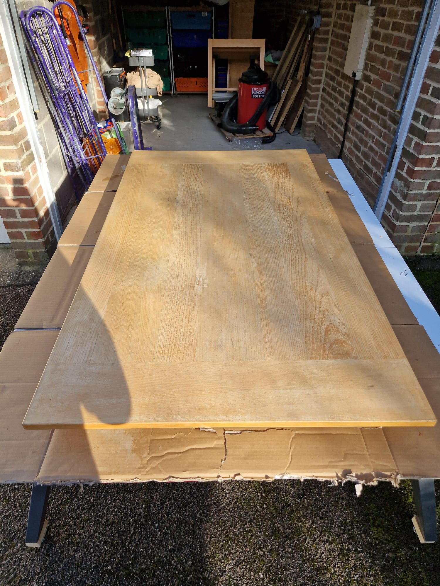 The table top with the old varnish removed