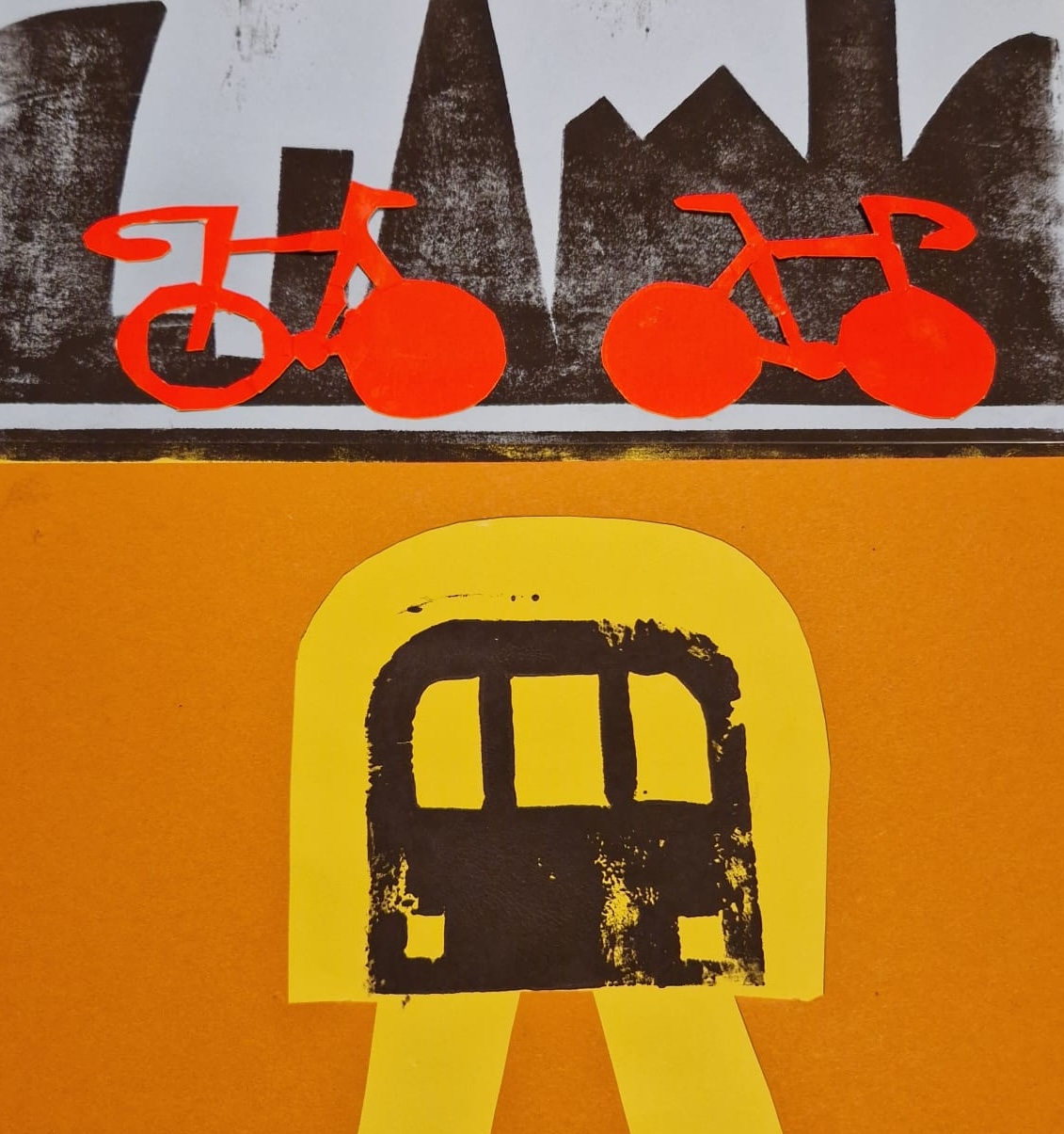 A block printed poster with two bikes against the London Skyline above a tube train in a tunnel